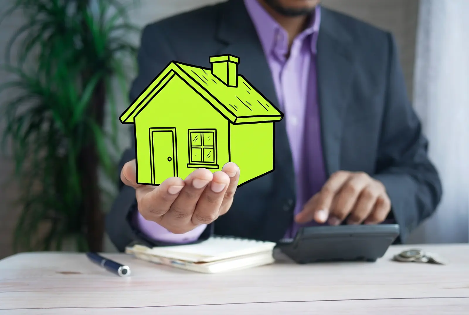 A property professional holding a model house, drawn in lime ink